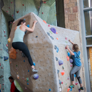students_rock_climbing
